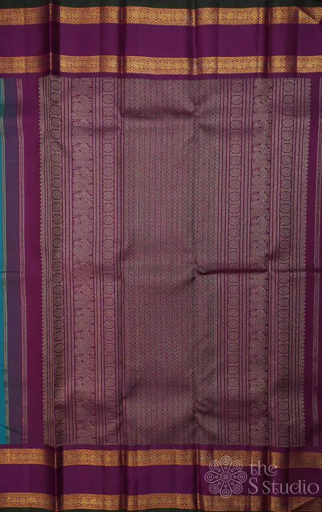 Anandha blue kanjivaram saree with korvai purple border