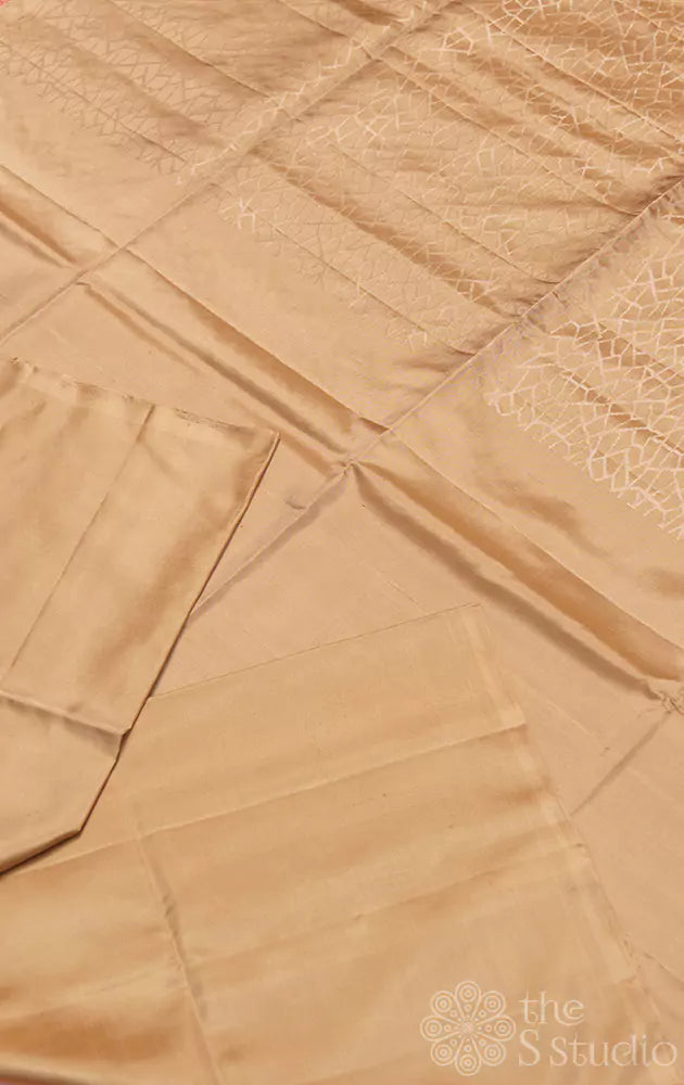 Beige plain soft silk saree with brocade pallu and blouse