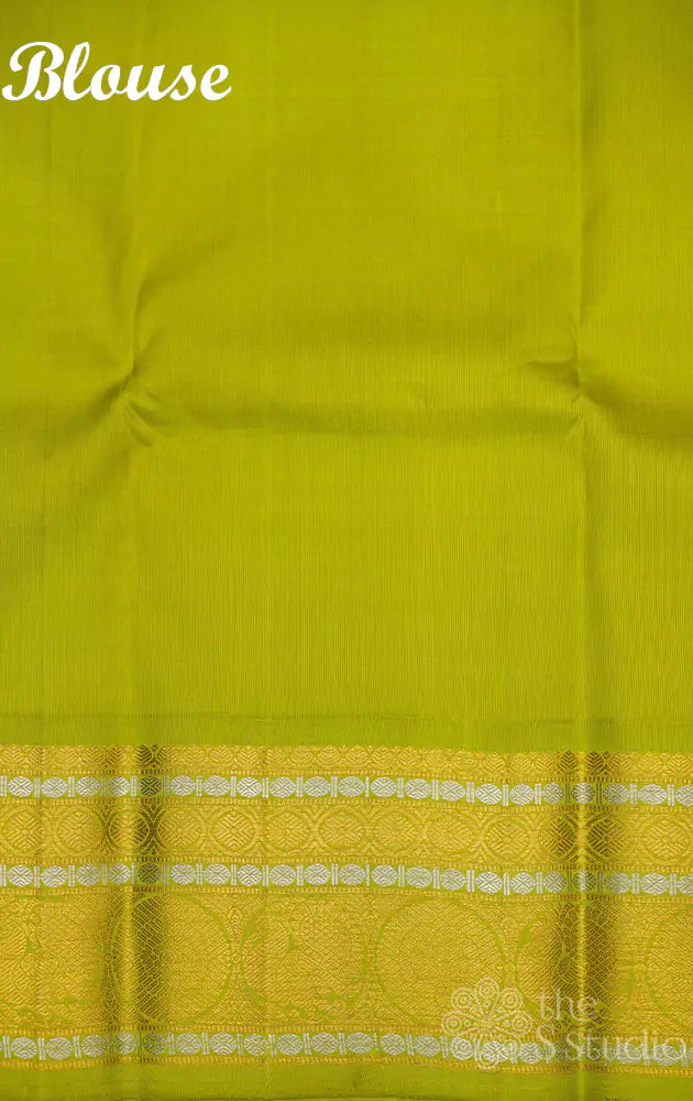 Lavender kanchipuram silk saree with small buttas and light green border