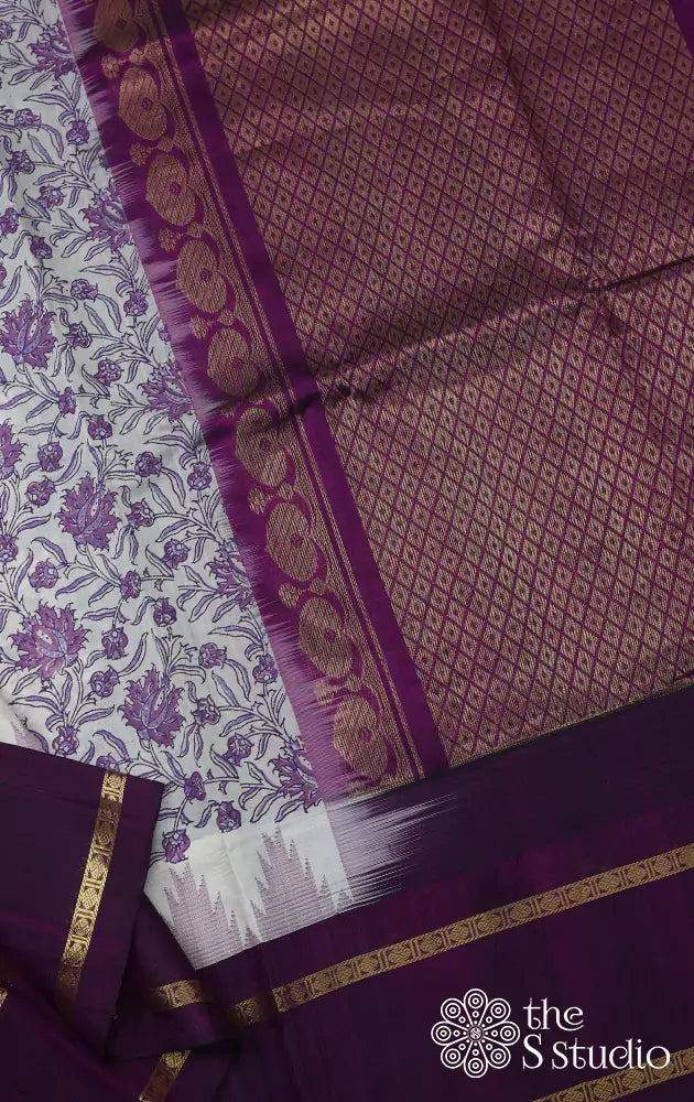 Off white printed silk cotton saree with purple silk border