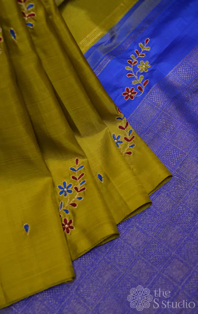 Methi green hand embroidered kanchi silk saree with royal blue pallu