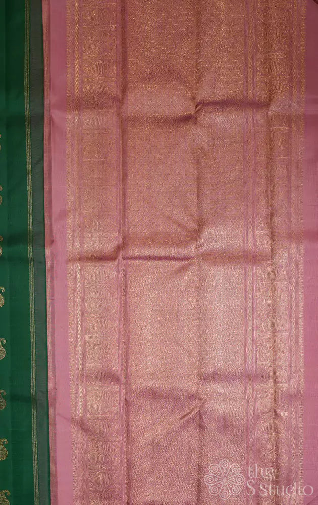 Leaf green mango buttas kanjivaram saree with onion pink zari rich pallu