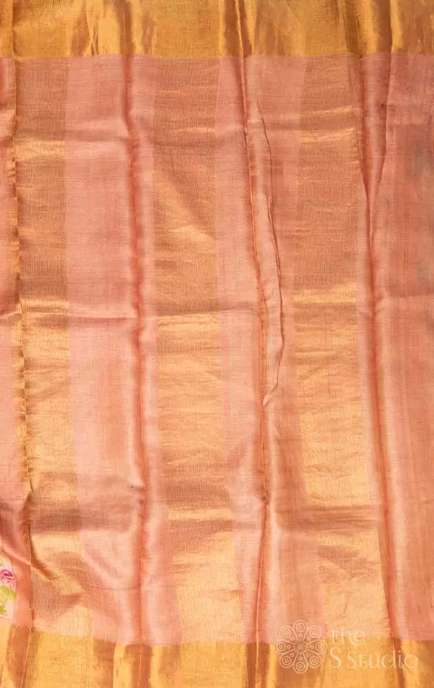 light peach printed tussar saree with zari border