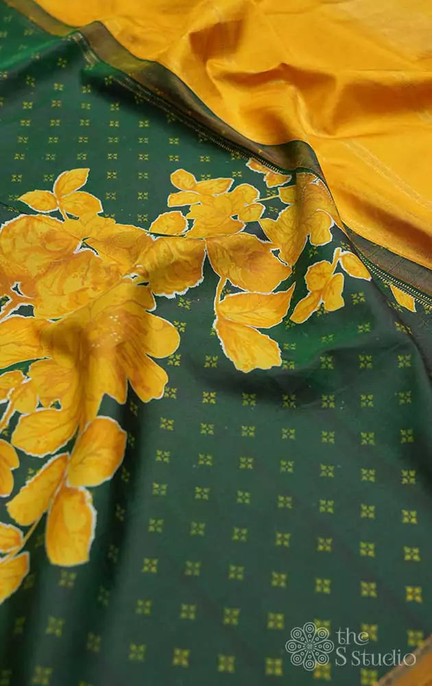 Bottle green kanchi silk saree with mustard floral prints